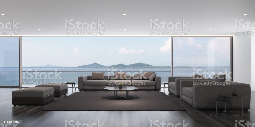Perspective Of Modern Luxury Living Room With Grey Sofa On Sea View  Backgroundidea Of Family Vacation Dark Timber Interior Design Architecture  Idea Of Large Window System 3D Rendering Stock Photo - Download